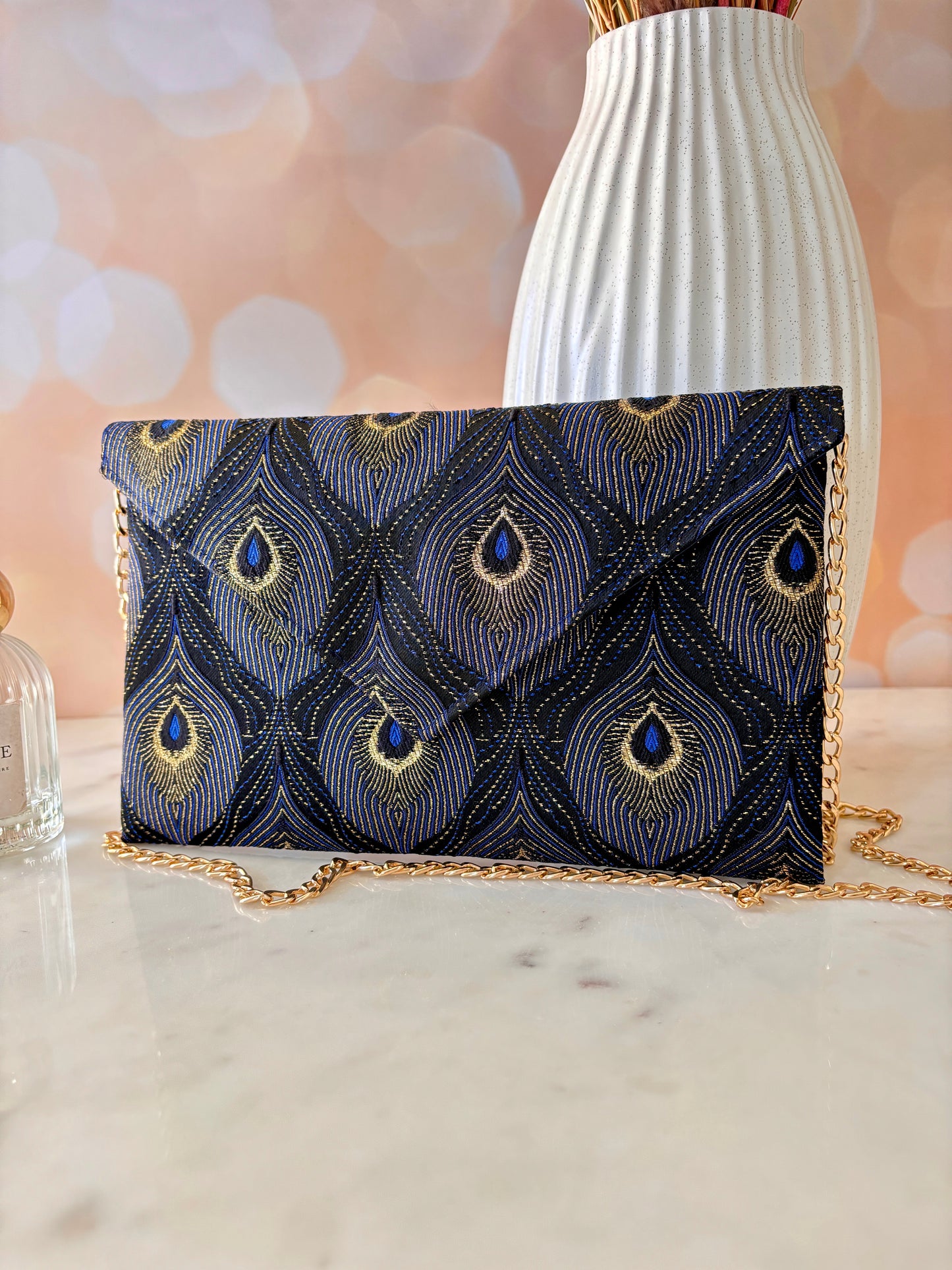 pochette de soirée en jacquard motif queue de paon - Fil des toiles