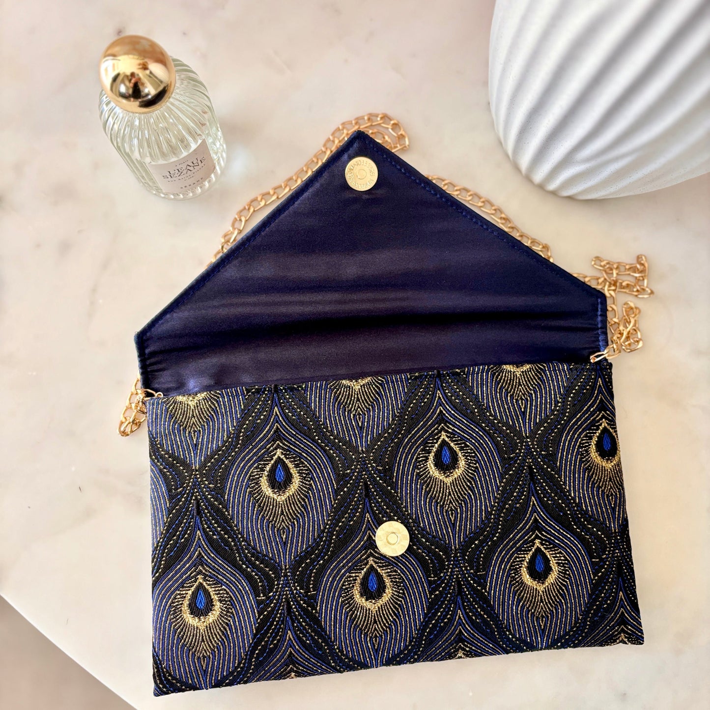 pochette de soirée en jacquard motif queue de paon - Fil des toiles