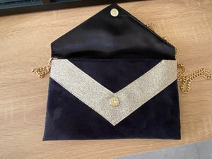 Sac pochette noire et paillettes dorées
