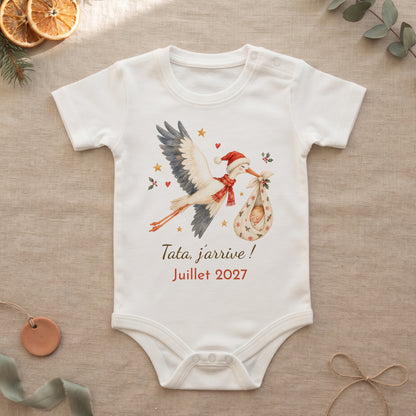 Body annonce grossesse cigogne de Noël avec le message Tata, j'arrive ! Juillet 2027,