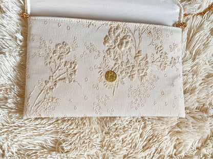Pochette mariage ivoire et dorée en tissu brocart