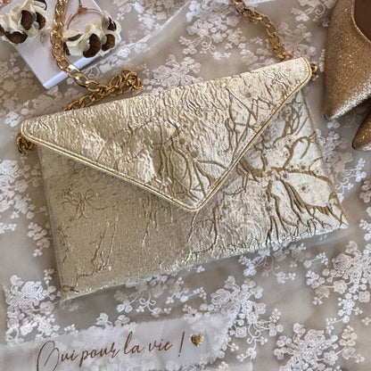 Pochette mariage champagne en brocart fleuri avec chaîne dorée