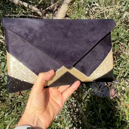 Aperçu vidéo des reflets pailletés dorés de la pochette à la lumière