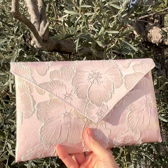 video de pochette rose poudrée