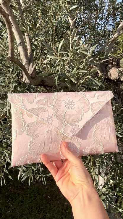 video de pochette rose poudrée