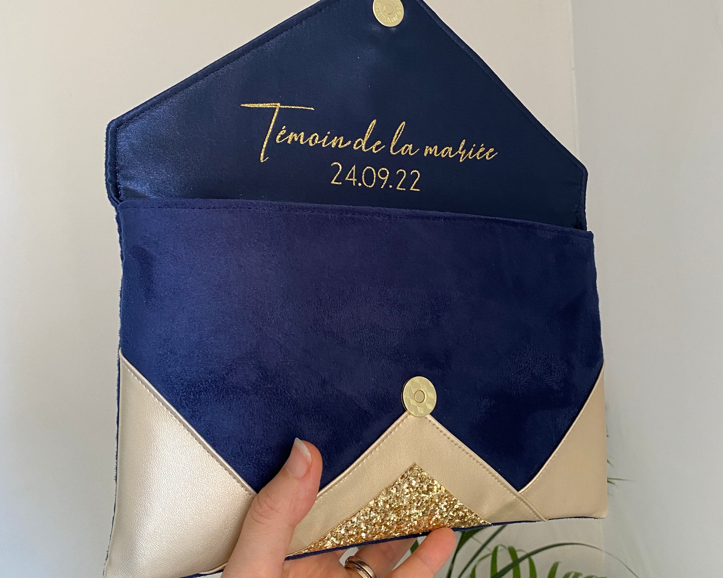 Pochette bleu best sale marine et doré